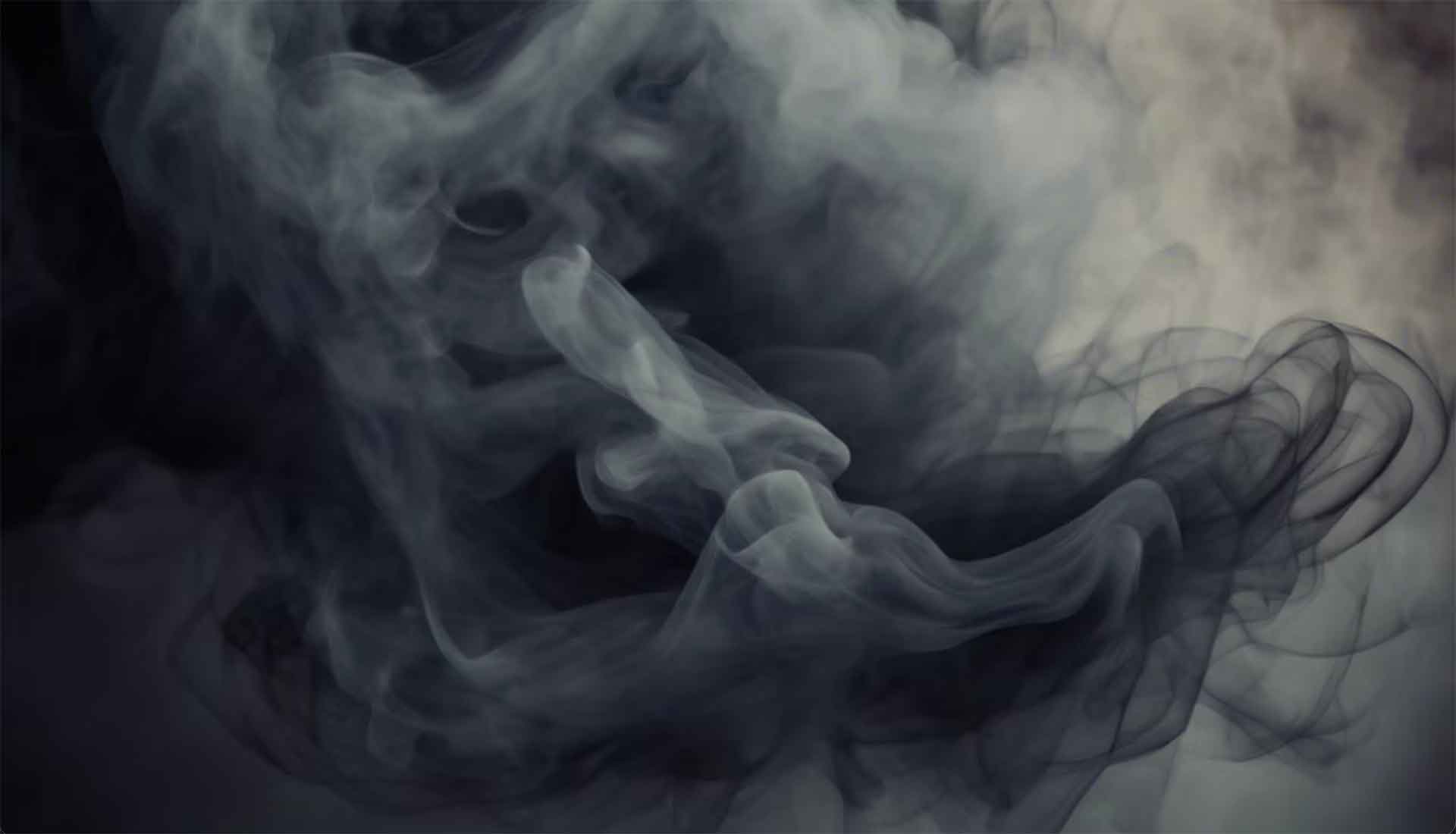 # Alt Text
Dense white and gray smoke swirling against a dark background