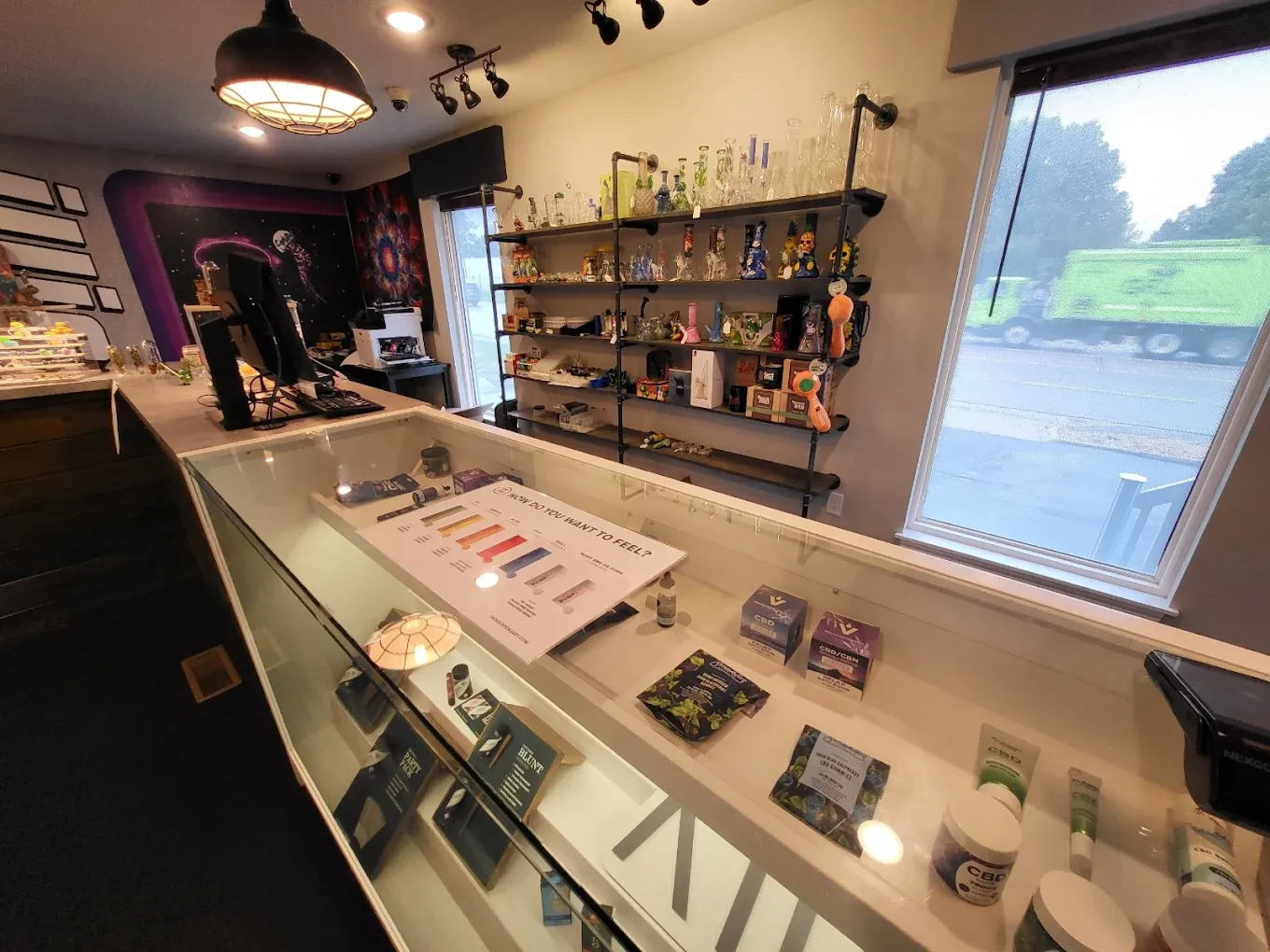 # Alt Text

Display case with cannabis products and informational materials at Sedalia dispensary location
